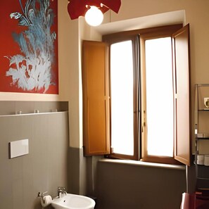Deluxe Townhome, Multiple Beds, Non Smoking, Housekeeping | Bathroom | Hair dryer, bidet, towels, soap