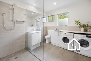 Shower, hair dryer, towels, soap