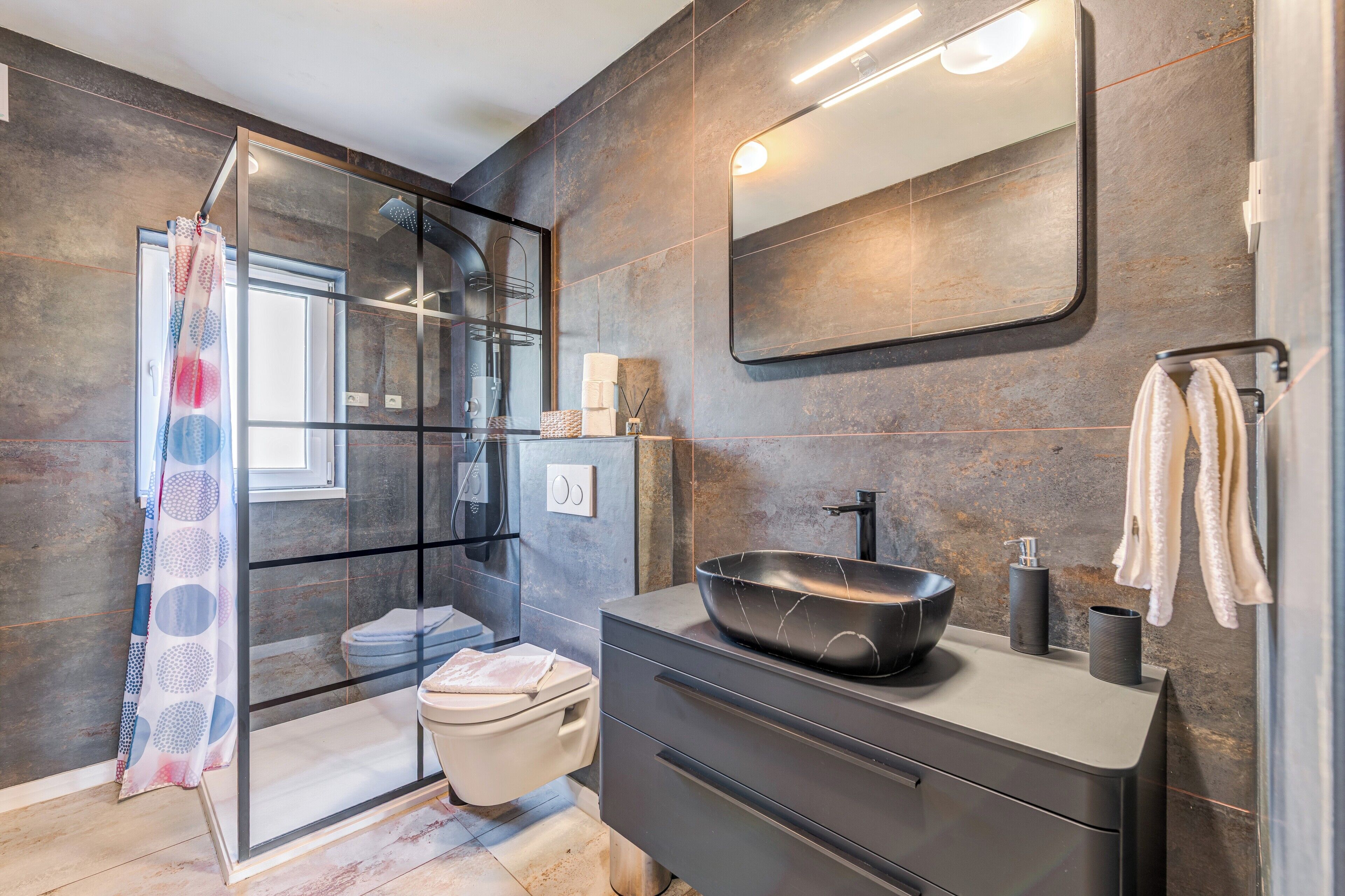 Shower, deep soaking tub, free toiletries, hair dryer