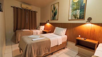 Traditional Triple Room | Minibar, bed sheets