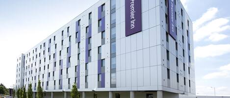 A modern Premier Inn hotel with a clean, rectangular facade, multiple windows, and a prominent signage.
