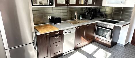 Comfort Apartment, Courtyard View | Private kitchen | Full-size fridge, microwave, oven, stovetop