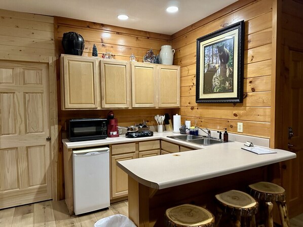 Microwave, coffee/tea maker, toaster, cookware/dishes/utensils