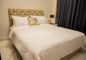 Single Room, Kitchenette | Desk, soundproofing, iron/ironing board, free WiFi - unreal homes (Dar es Salaam)