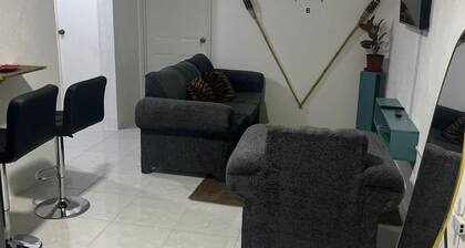 Charming 3-bedroom apartment in enchanting St. Andrew Parish with AC, WiFi.