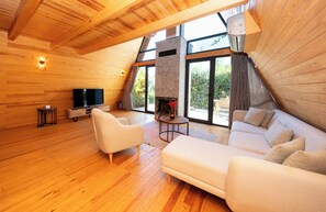 Appartement, uitzicht op tuin | 1 slaapkamer, verduisterende gordijnen, een strijkplank/strijkijzer