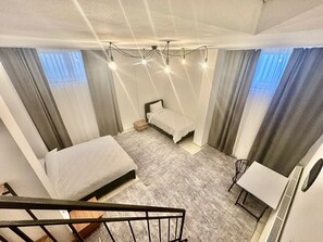 2 bedrooms, desk, iron/ironing board, travel crib