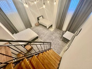 2 bedrooms, desk, iron/ironing board, travel crib