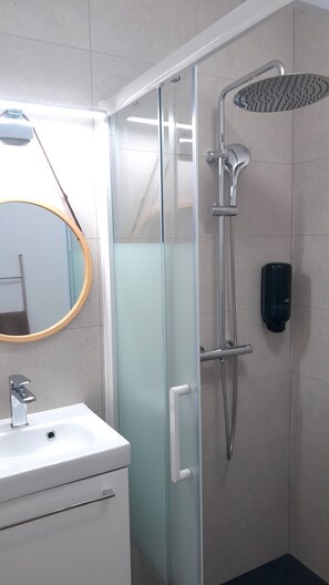 Hair dryer, towels, soap, shampoo