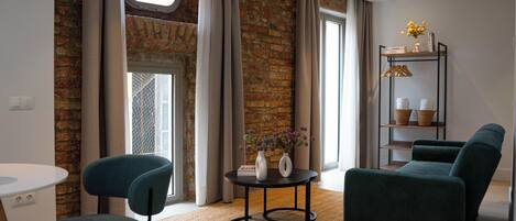 Appartement supérieur | Aire de séjour | Téléviseur au plasma