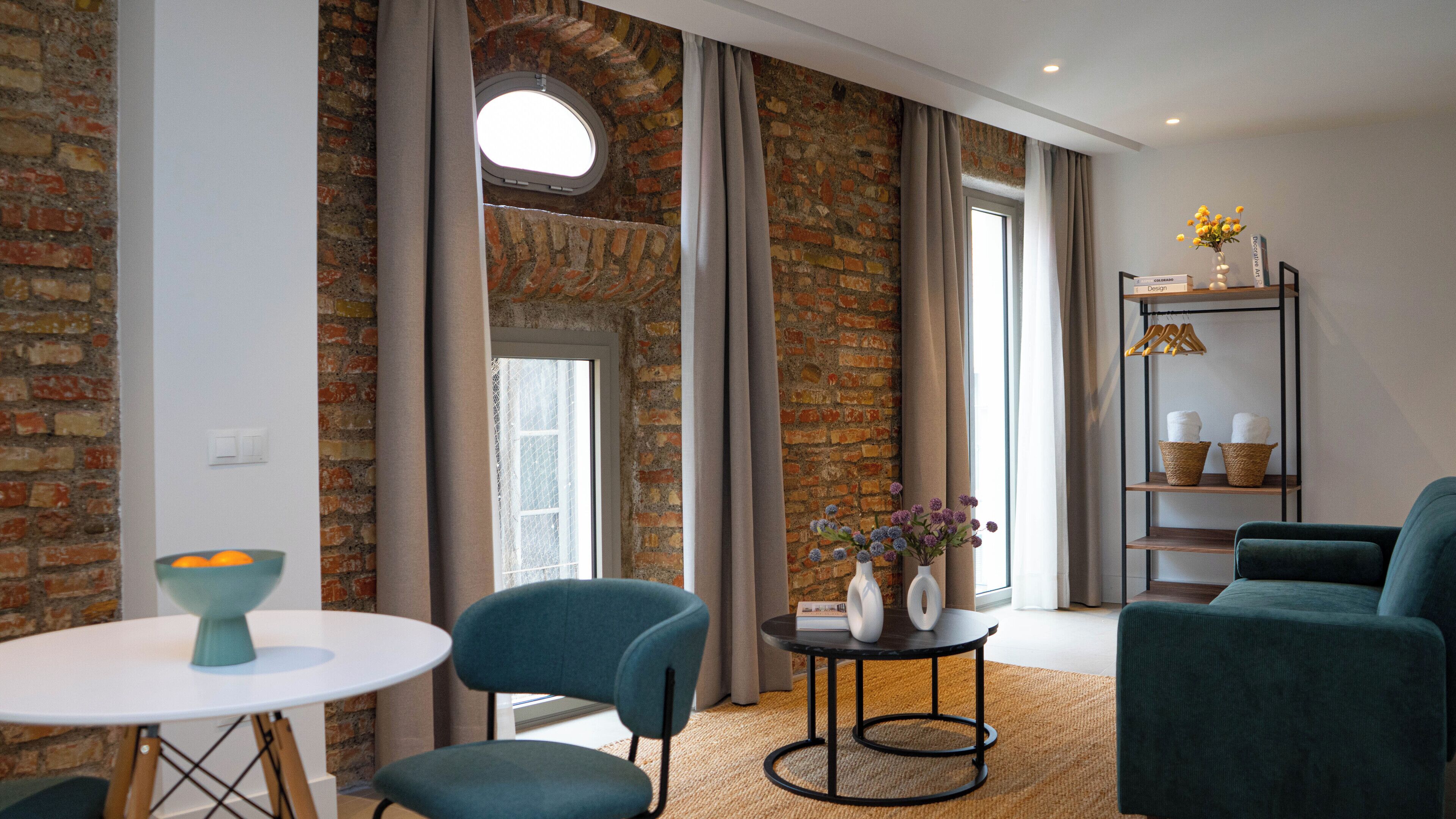 Superior-Apartment | Wohnbereich | Plasmafernseher