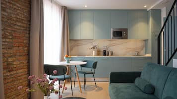 Penthouse, Balcony, City View | Private kitchen | Coffee/tea maker, fridge, microwave, oven