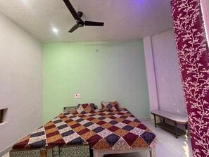Economy Room, 3 Bedrooms | Laptop workspace, iron/ironing board, free WiFi, bed sheets - Arya Sadan Homestay (Mathura)