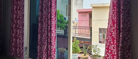 Economy Room, 3 Bedrooms | In-room safe, laptop workspace, iron/ironing board, free WiFi