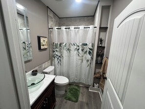 Hair dryer, towels, soap, shampoo