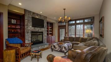 Smart TV, fireplace, foosball, books