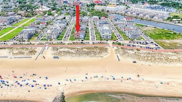 On the beach, sun loungers, beach towels