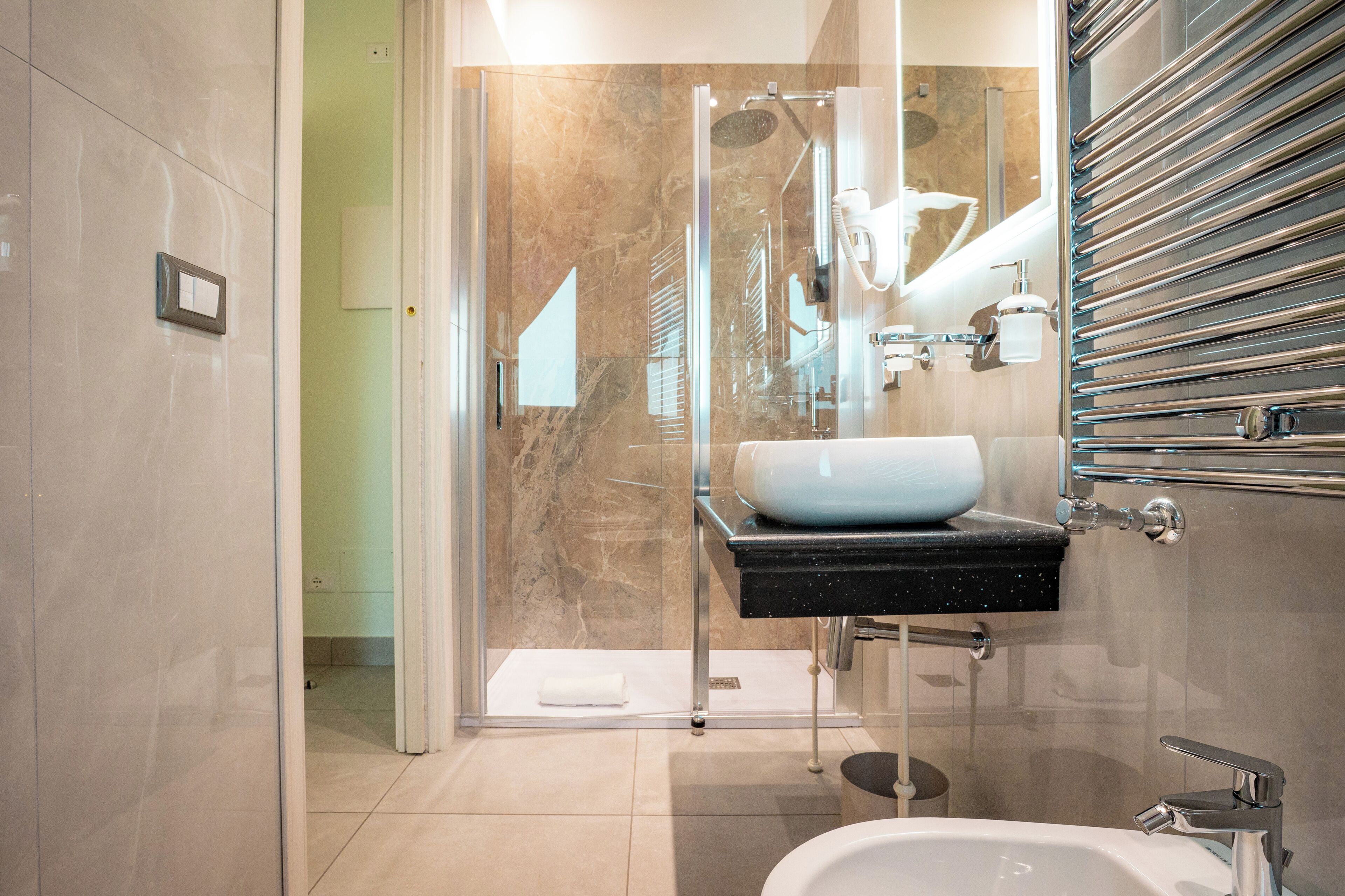 Classic Apartment | Bathroom | Shower, hair dryer, towels, soap