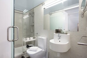 Hair dryer, towels, soap, shampoo