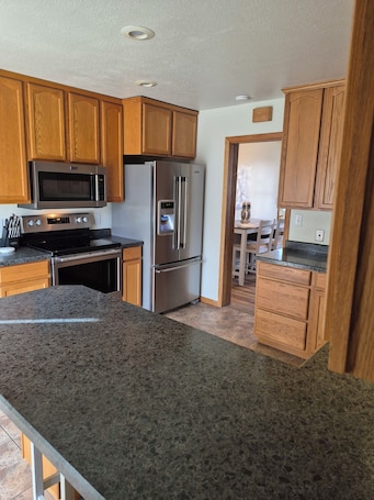 Private kitchen. House in central Bismarck location. Stay at a spacious 4-bedroom house
