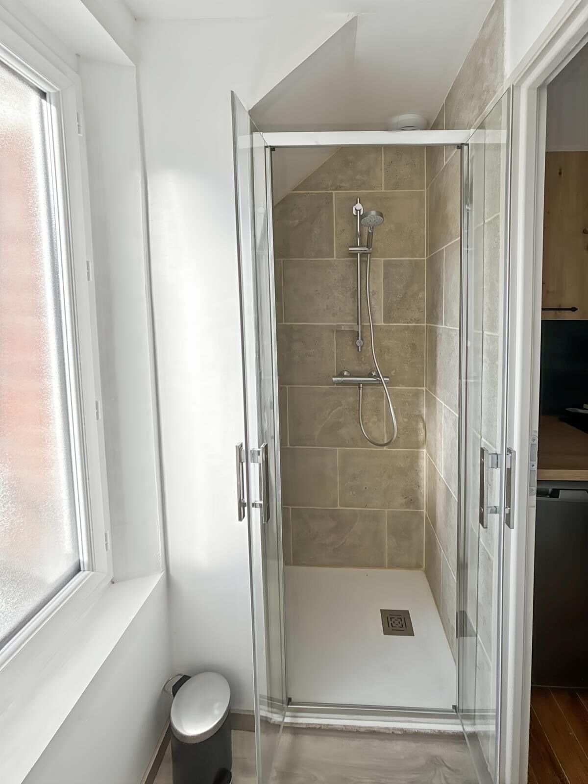 Shower, towels, soap, toilet paper