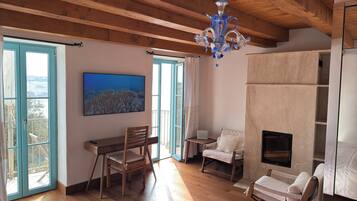 Suite de lujo, vista al mar | Sábanas de algodón egipcio y ropa de cama de alta calidad