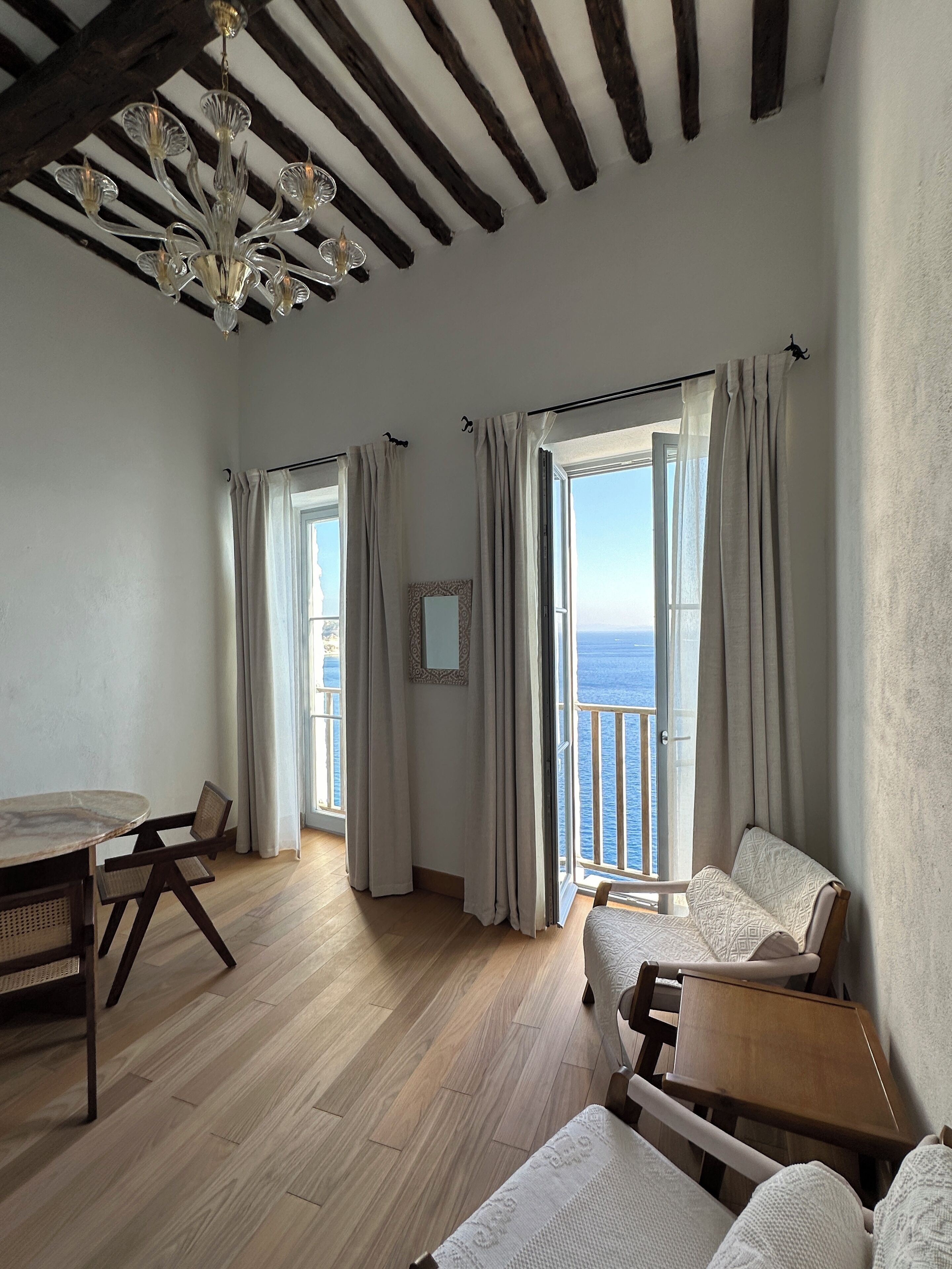 Presidential Studio Suite, Sea View | Living area | 55-inch Smart TV with cable channels, Netflix, streaming services