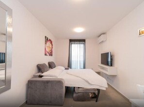1 chambre, fer et planche Ă repasser, Wi-Fi, draps fournis