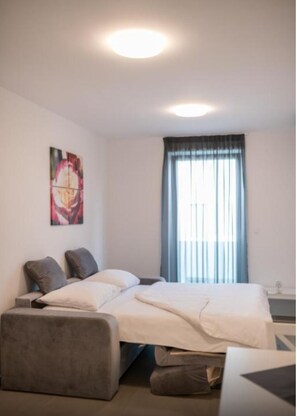 1 habitación, tabla de planchar con plancha, wifi y ropa de cama 