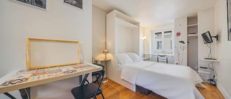 1 chambre, fer et planche à repasser, Wi-Fi gratuit, draps fournis