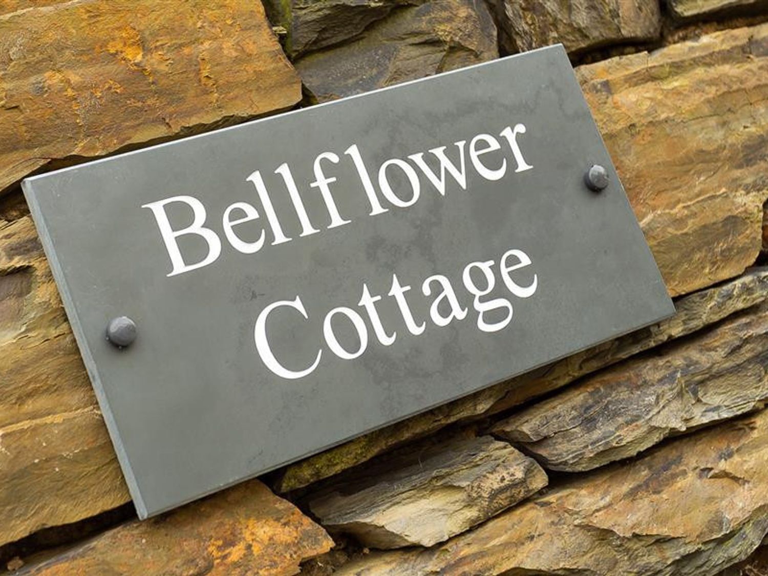 Cartell per a Bellflower Cottage.