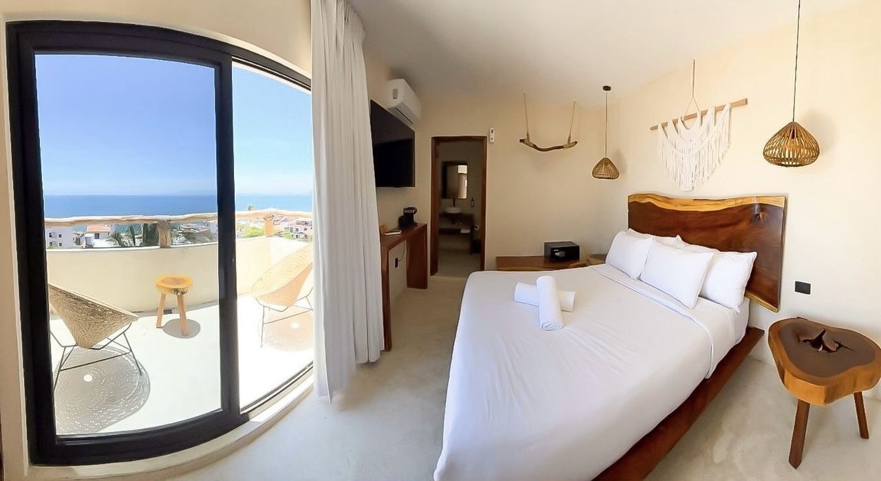 Habitación, 1 cama Queen size, vista al mar | Insonorización, tabla de planchar con plancha y wifi gratis 
