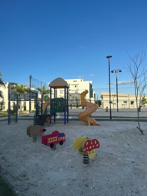 Children’s area - 3-bedroom apartment downtown Punta Cana with pools near the beach (Punta Cana)