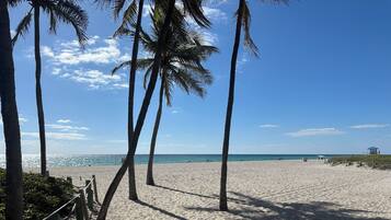 On the beach, sun-loungers, beach towels