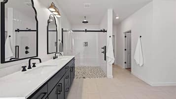 Shower, towels, soap, toilet paper