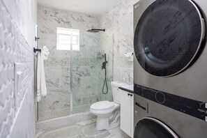 Shower, hair dryer, towels, soap