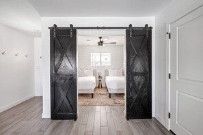 4 bedrooms, desk, iron/ironing board, travel cot