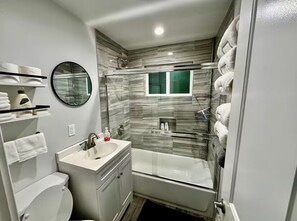 Hair dryer, towels, soap, shampoo