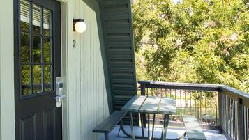 Deluxe Suite, 2 Double Beds, Pool View | Terrace/patio