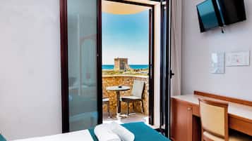 Standard Triple Room, Balcony, Sea View | In-room safe, desk, blackout drapes, soundproofing