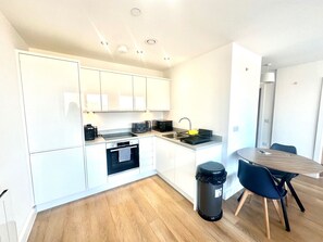 Apartment | Private kitchen | Fridge, microwave, oven, stovetop