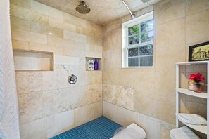 Shower, hair dryer, towels, soap