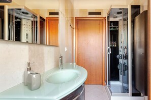 Hair dryer, bidet, towels, soap