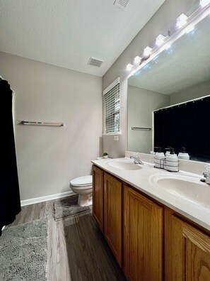 Hair dryer, towels, soap, shampoo