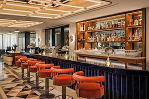 3 bars/lounges, lobby lounge, rooftop bar