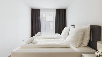 2 bedrooms, iron/ironing board, WiFi, bed sheets