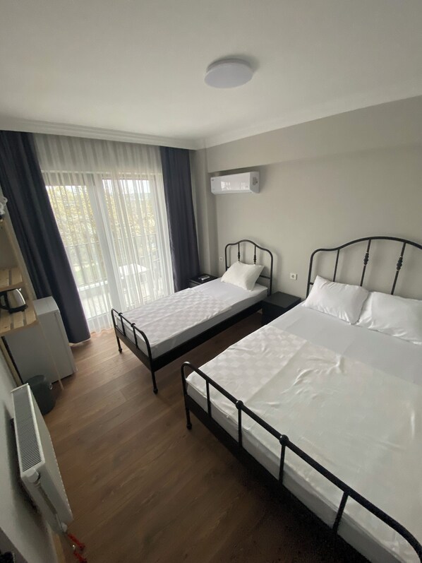 Chambre Triple Familiale, vue mer | Wi-Fi gratuit