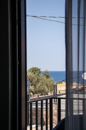 Chambre Triple Familiale, vue mer | Wi-Fi gratuit