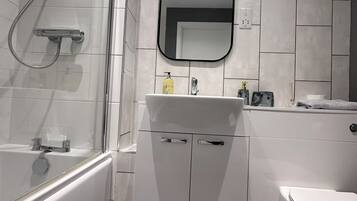 Hair dryer, towels, soap, toilet paper