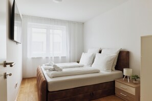 1 habitación, tabla de planchar con plancha, wifi y ropa de cama 